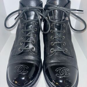 CHANEL Glossy Black Lace-Up Boots